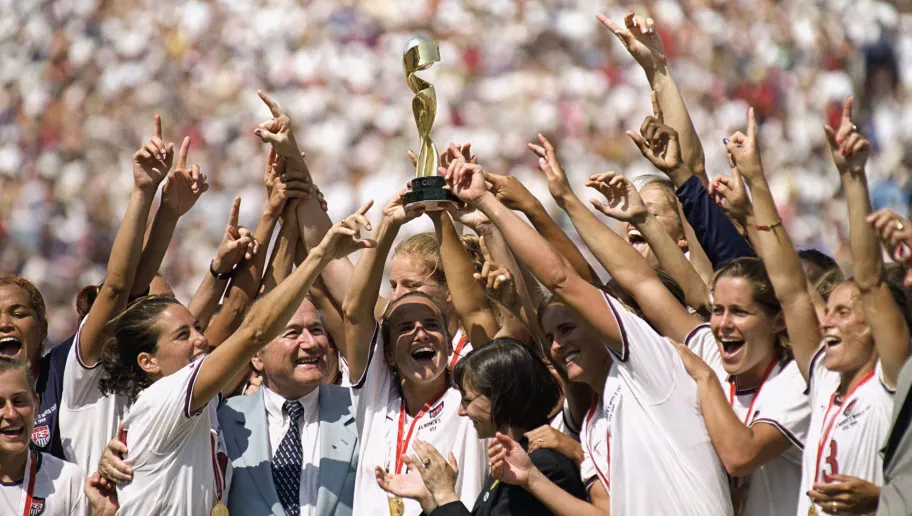 carla-overbeck-celebrates-world-cup-with-team-5ccb0bdaea674dfa66000002.webp